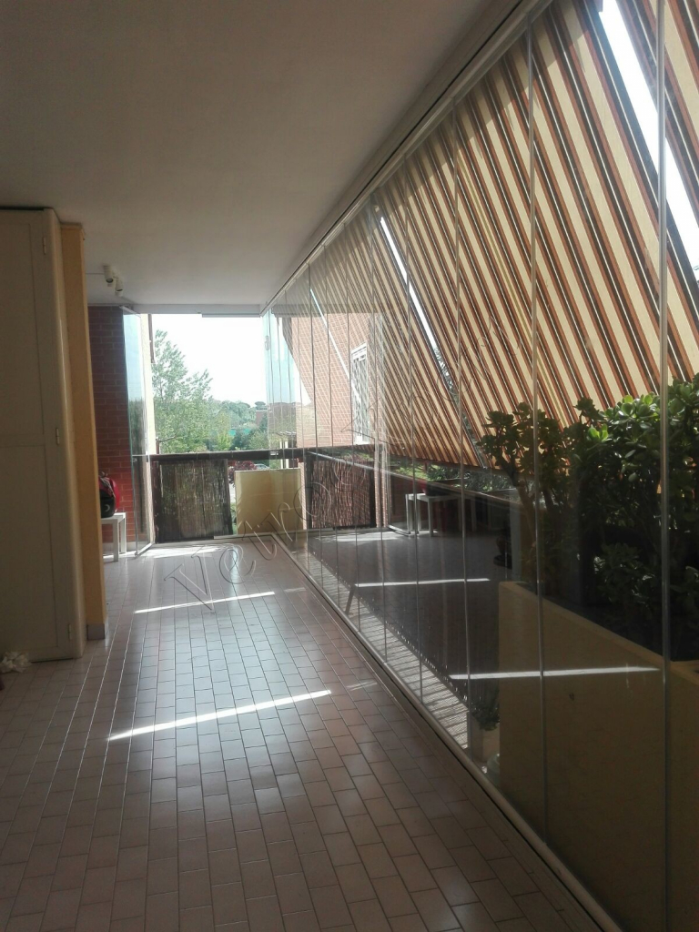 Vetrate panoramiche a pacchetto installate a Fonte Laurentina Roma VetroeXpert Vetrate Pieghevoli e vetrate a scomparsa Glassroom
