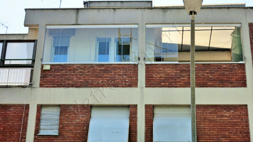 Vetrate pieghevoli per balconi vista dal basso Roma VetroeXpert Vetrate Pieghevoli e vetrate a scomparsa Glassroom 1